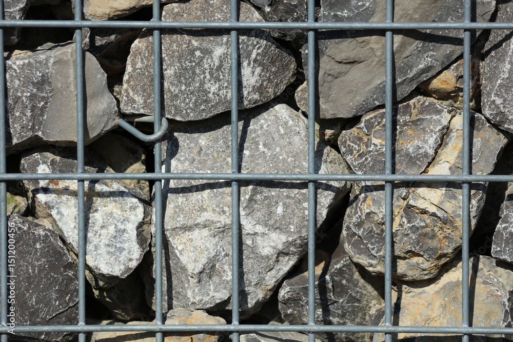 Gabione gefüllt mit Muschelkalk StockFoto Adobe Stock