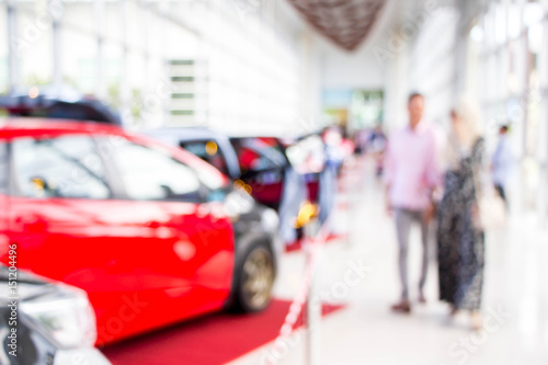 blurred visitors at motor show