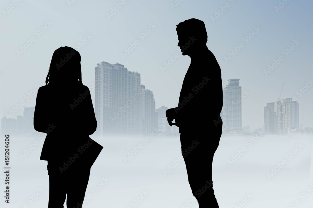 silhouette of businessman and woman silhouette of businessman and woman