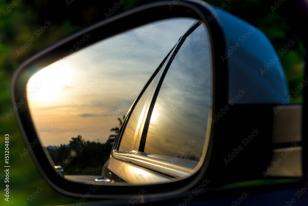 car side view mirror on the road