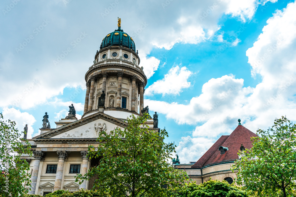 German Church in Berlin is one of three major buildings at Gendarmenmarkt square in the Mitte district German Church in Berlin is one of three major buildings at Gendarmenmarkt square in the Mitte district