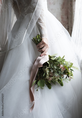 Εκτύπωση καμβά Attractive Beautiful Bride Holding Flowers Bouquet
