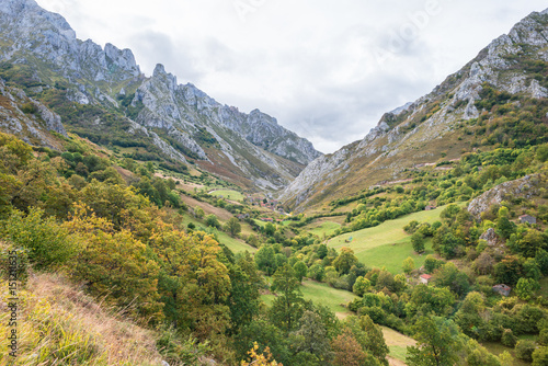The hamlet Áliva and Uriellu in the Rio Duel valley, situated in the Peaks of Europe, Spanish Los Picos de Europa, Asturias Spain. The valley is wonderful for hiking and leads along the river Duel
