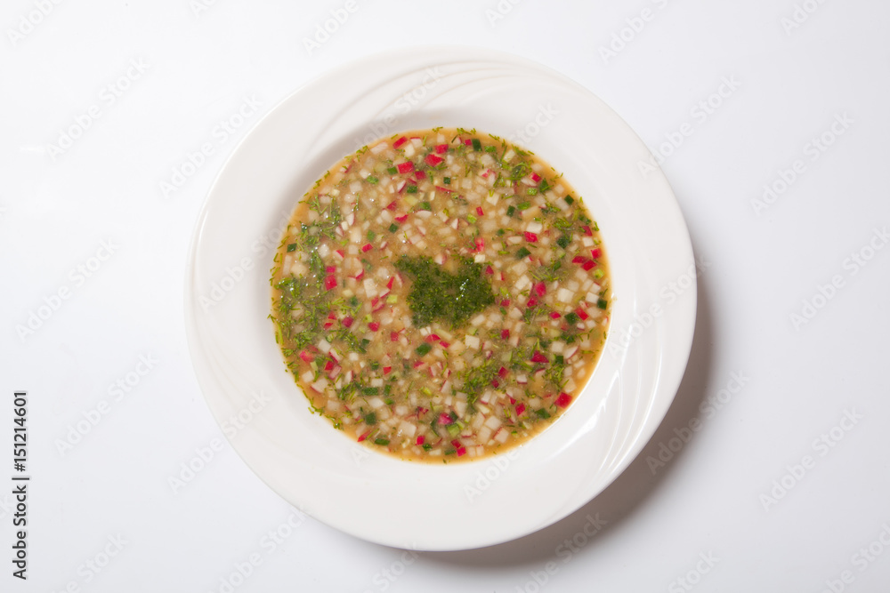 Russian cold vegetable soup on yogurt, sour-milk base - okroshka Russian cold vegetable soup on yogurt, sour-milk base - okroshka
