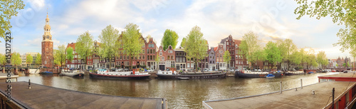 Canals of Amsterdam. Sunny panorama of old town district