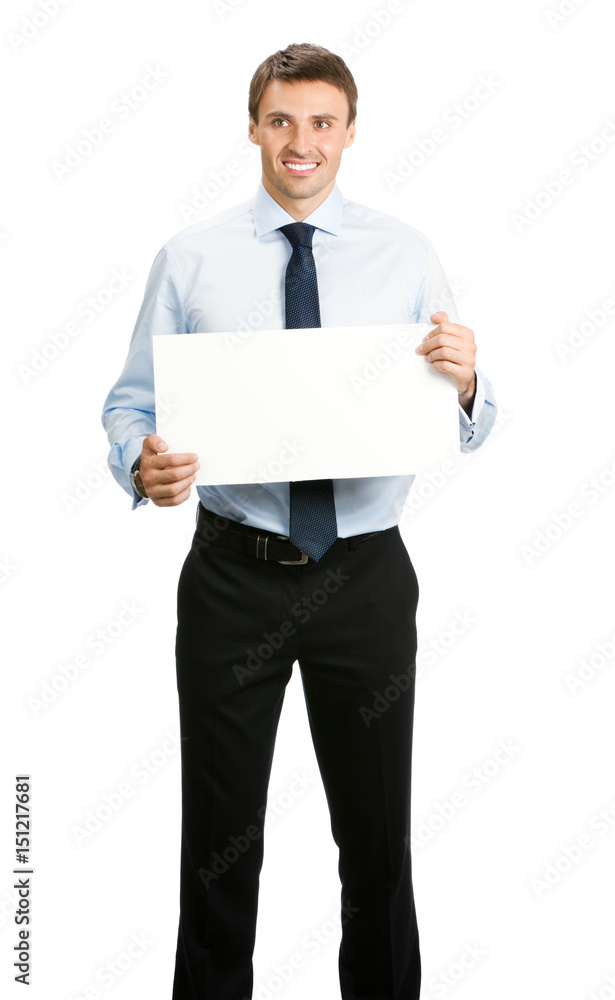 Full body of businessman showing signboard, isolated Full body of businessman showing signboard, isolated