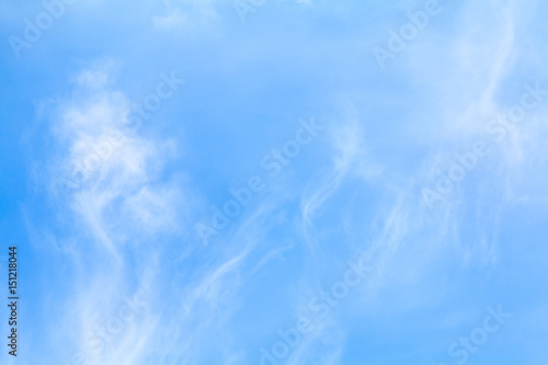 White clouds in the blue sky on a sunny day