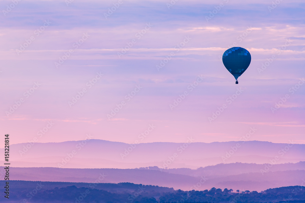 Hot Air Balloon Floating Over The Mountains In The Twilight Hot Air Balloon Floating Over The Mountains In The Twilight