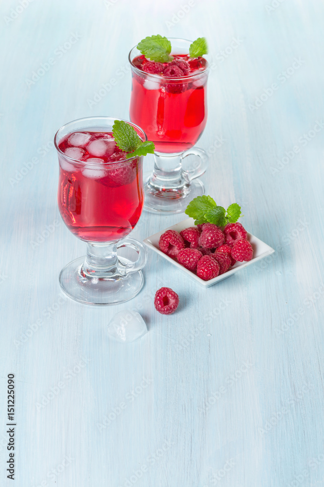Alcohol cocktail with raspberries and mint Alcohol cocktail with raspberries and mint