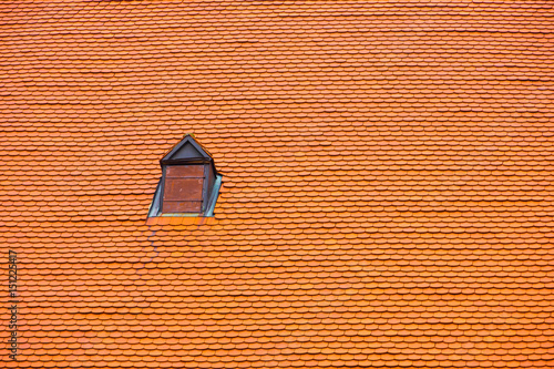 Red roof with closed window, detail