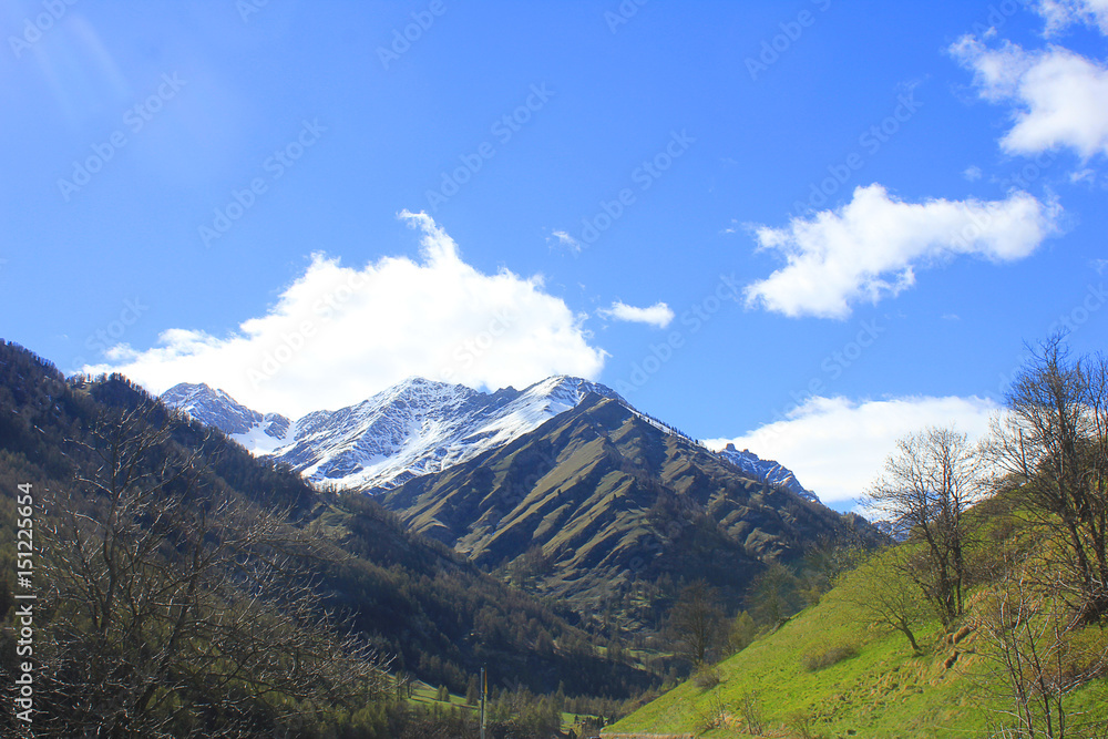 mountain landscape with clouds and vegetation
