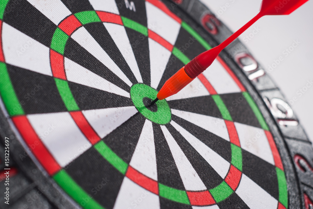 Arrow dart hitting the center of the target Arrow dart hitting the center of the target