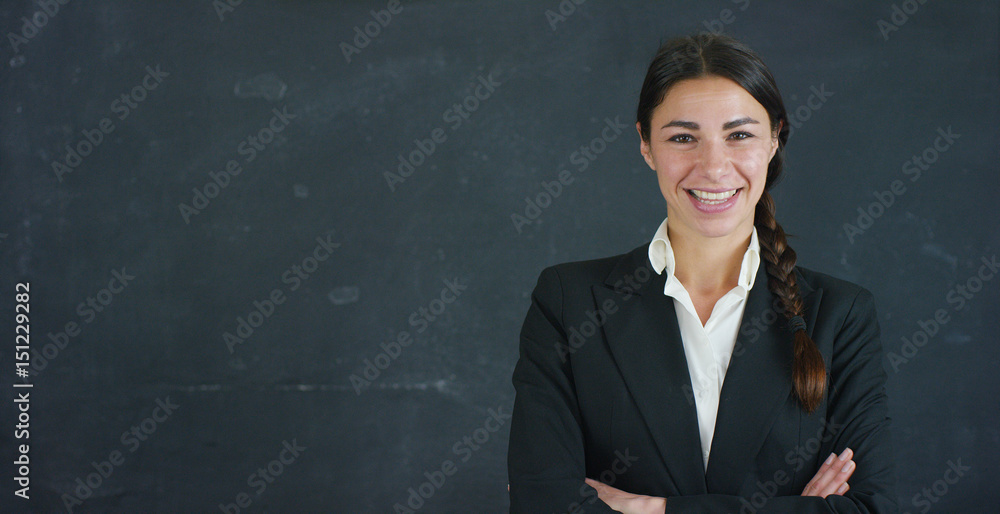 Portrait of a beautiful business girl, a marketing teacher, thinking about new ideas and strategies, on a black background. Concept: career growth, growth chart, successful girl, marketing, ideas. Portrait of a beautiful business girl, a marketing teacher, thinking about new ideas and strategies, on a black background. Concept: career growth, growth chart, successful girl, marketing, ideas.