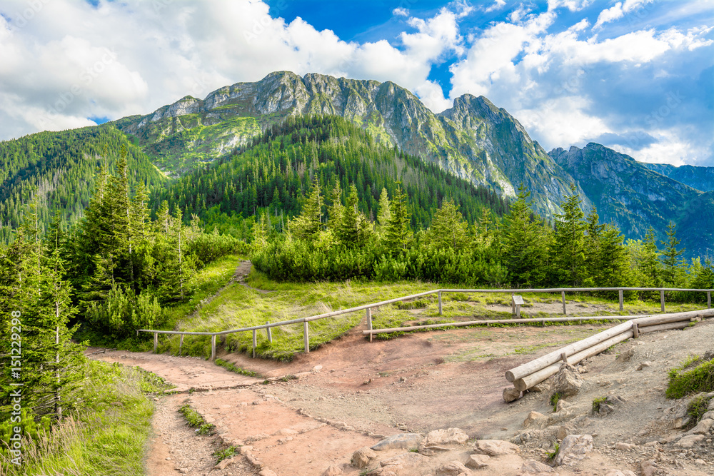 Panorama of mountains, spring landscape, view from hiking trail on peak of Giewont Panorama of mountains, spring landscape, view from hiking trail on peak of Giewont
