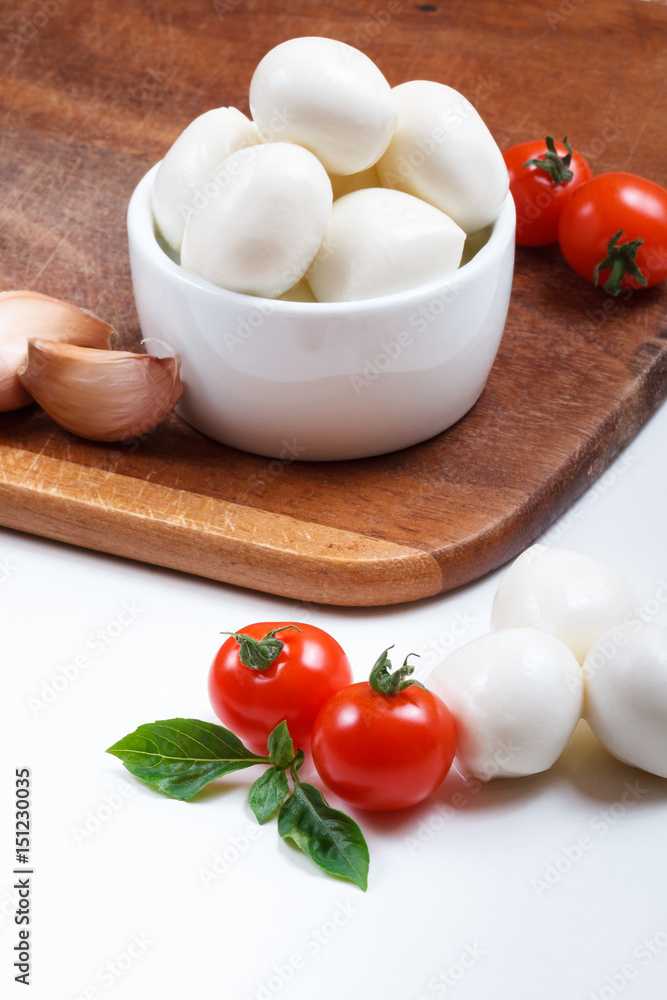Composition with cherry mozzarella, cherry tomatoes,basil and garlic 
