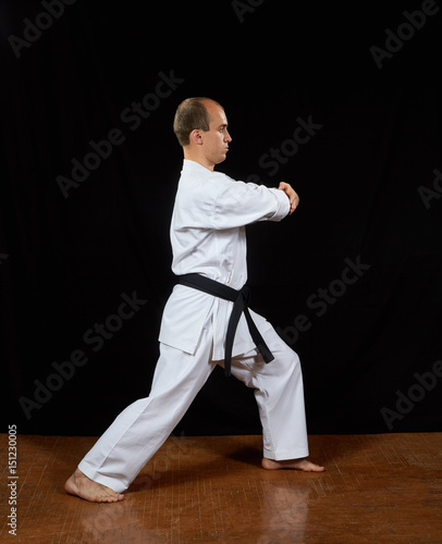 In karategi, a sportsman is doing blocks with his hands Kaderov