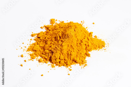 Heap of turmeric. Isolated on white.