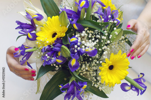 Fototapeta Naklejka Na Ścianę i Meble -  Bouquet with hands