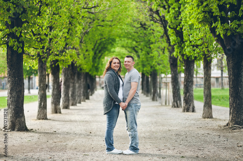 Happy loving couple outdoors in a park © and.one