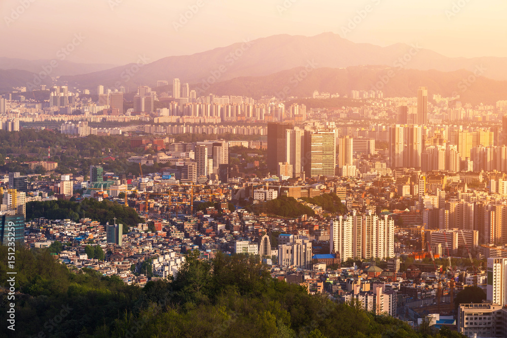 Seoul City skyline with downtown skyscrapers at sunset. Seoul City skyline with downtown skyscrapers at sunset.