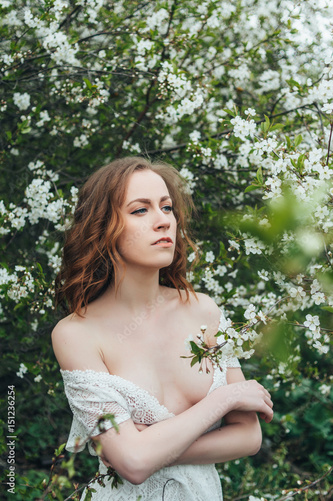 Red-haired girl in cherry Red-haired girl in cherry