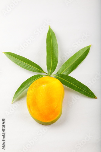 Tropical Alphonso mango slices with leaves 