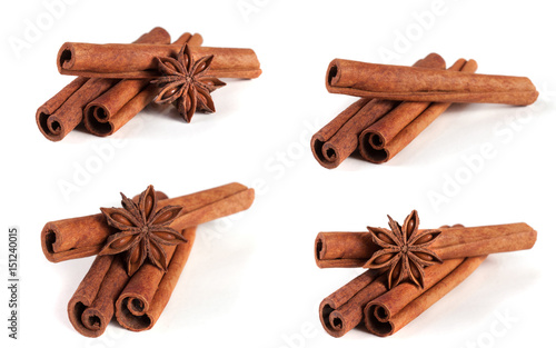 three cinnamon sticks with star anise isolated on white background. Collection or set