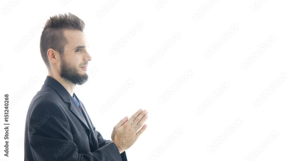 Profile of happy bearded thoughtful businessman gesturing with hands and meditating, studio isolated on white background. Profile of happy bearded thoughtful businessman gesturing with hands and meditating, studio isolated on white background.