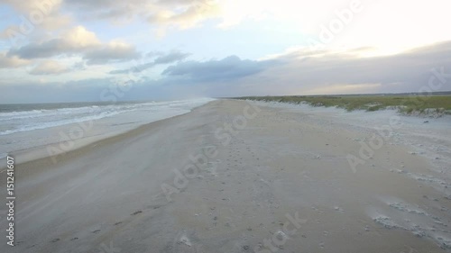 Aerial hovering shot down Masonboro Island beach 2 photo