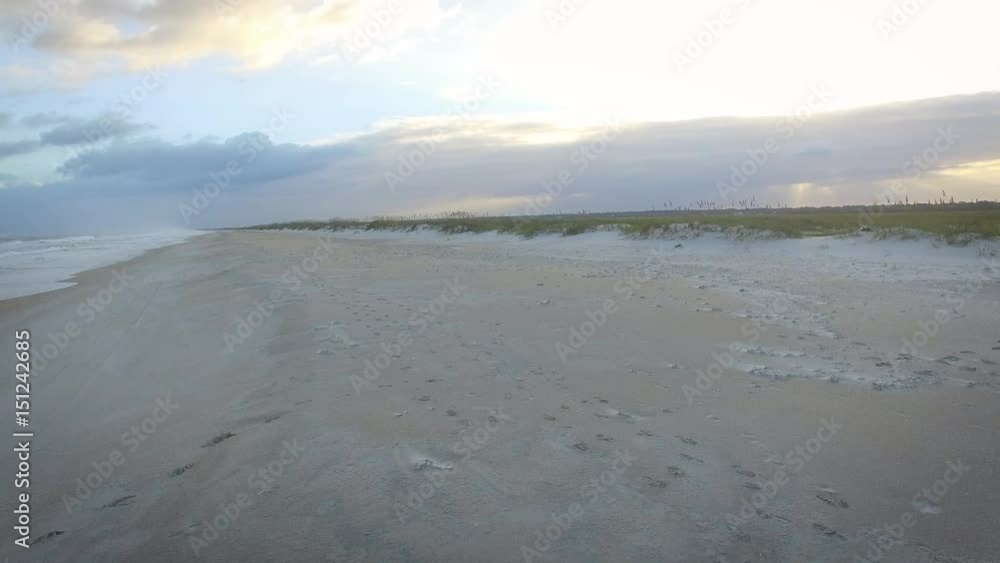 Aerial hovering shot of dunes and shore Masonboro Island beach Aerial hovering shot of dunes and shore Masonboro Island beach