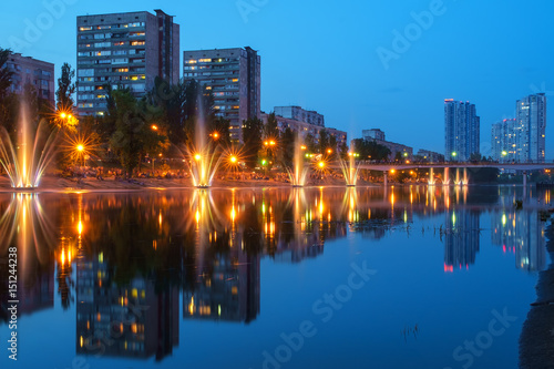 Colorful fountains and city lights