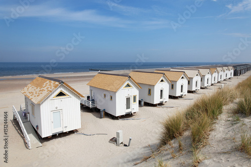 Beach house on the beach near the sea photo