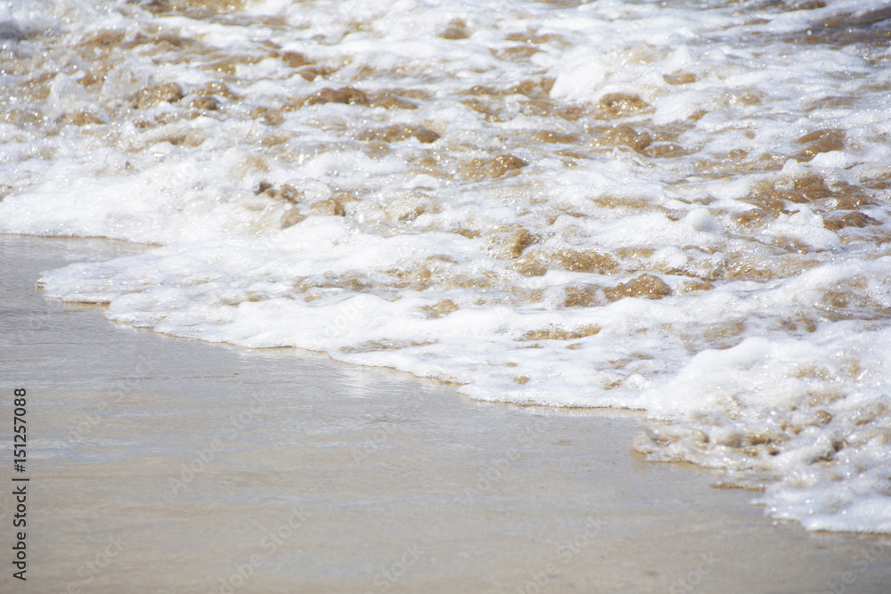 The sea exploding on the shore of the beach The sea exploding on the shore of the beach