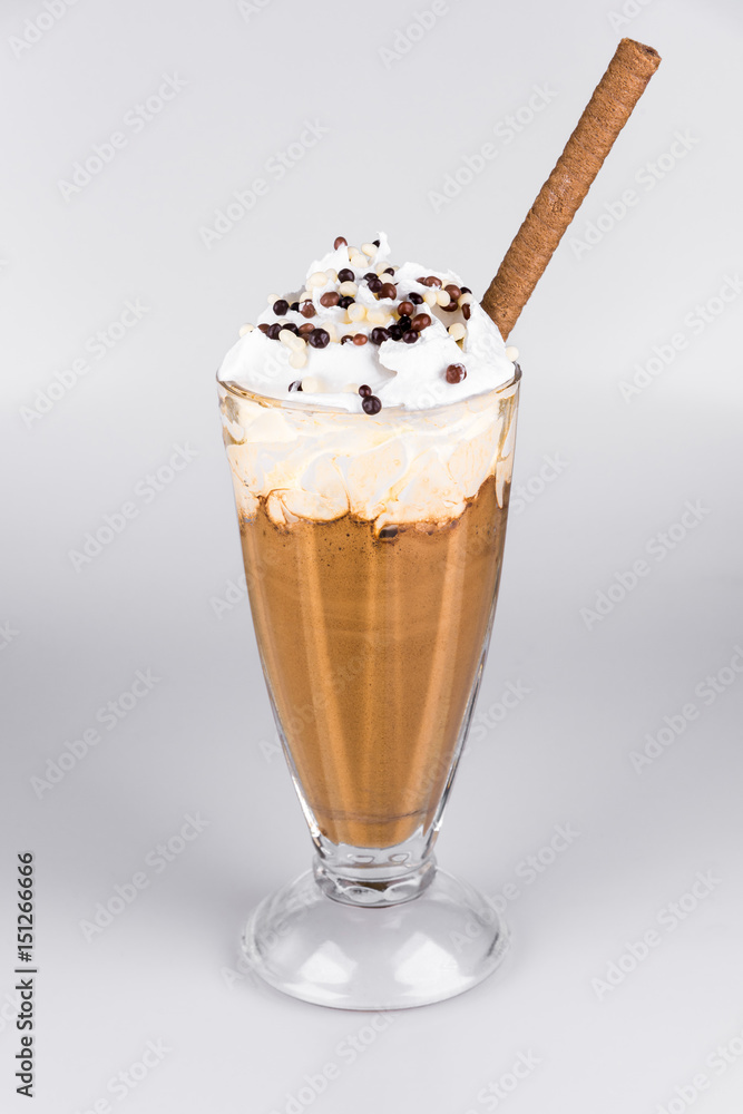 Latte with whipped cream on isolated white background Latte with whipped cream on isolated white background