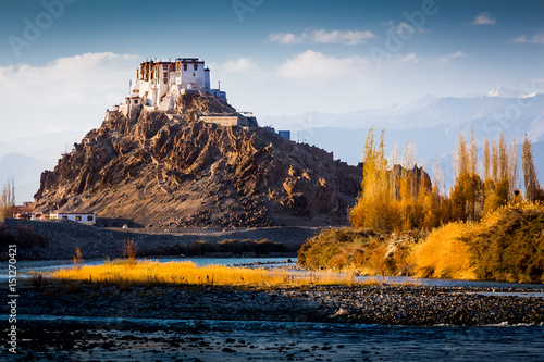 The Buddhist monastery of Stakna above Indus river in the Indian Himalaya in late autumn. Stakna, Ladakh, India photo