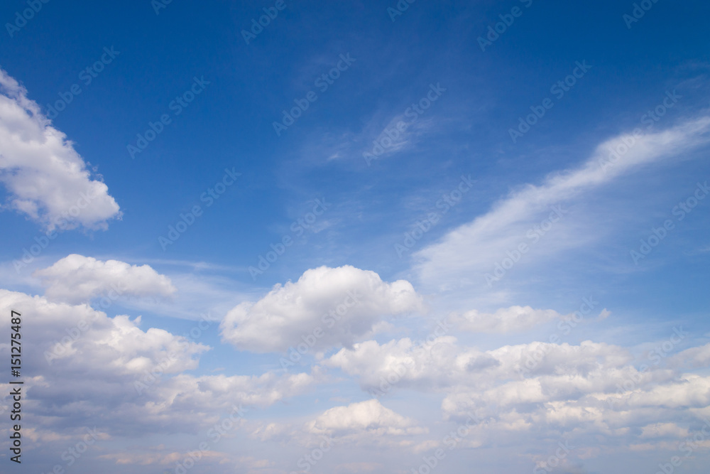 Blue sky with close up white fluffy tiny clouds background and p Blue sky with close up white fluffy tiny clouds background and p