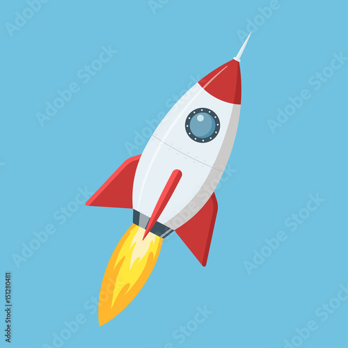 Fototapeta Flying cartoon rocket in flat style isolated on blue background