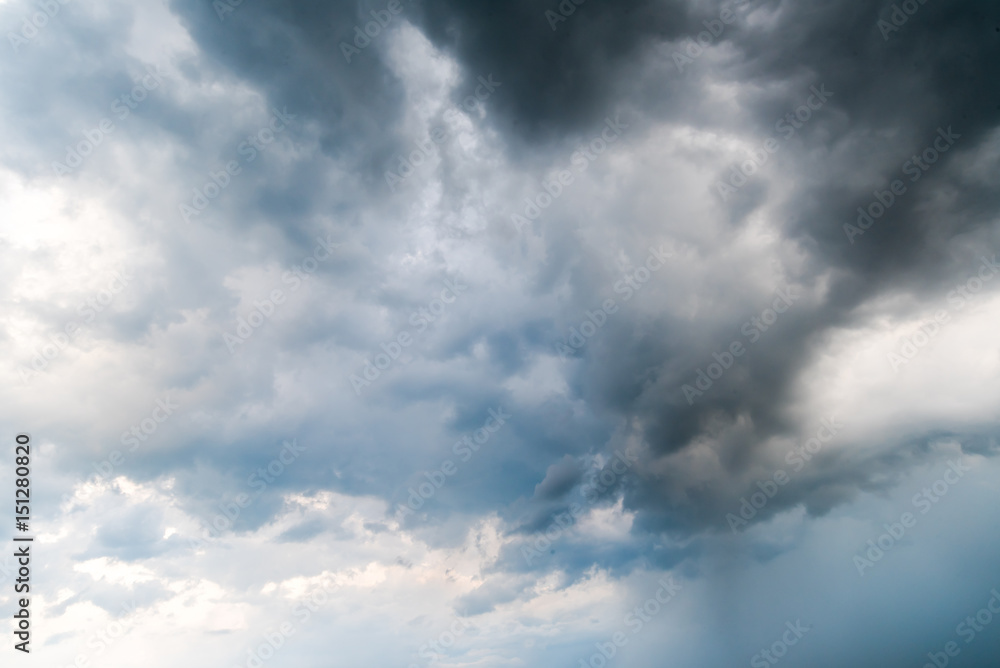 black sky Background of dark clouds before a thunder.
sunlight through very dark clouds background of dark storm clouds