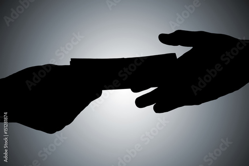 Two People Hands With Money photo