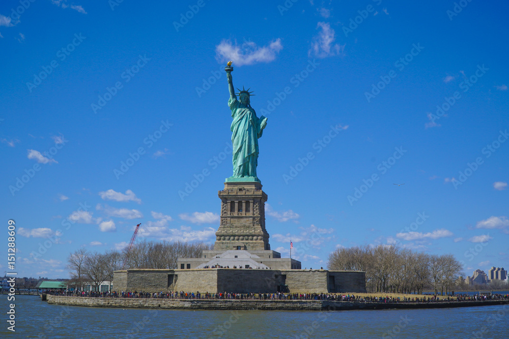 Liberty Island in New York with the famous Statue of Liberty- MANHATTAN / NEW YORK - APRIL 1, 2017