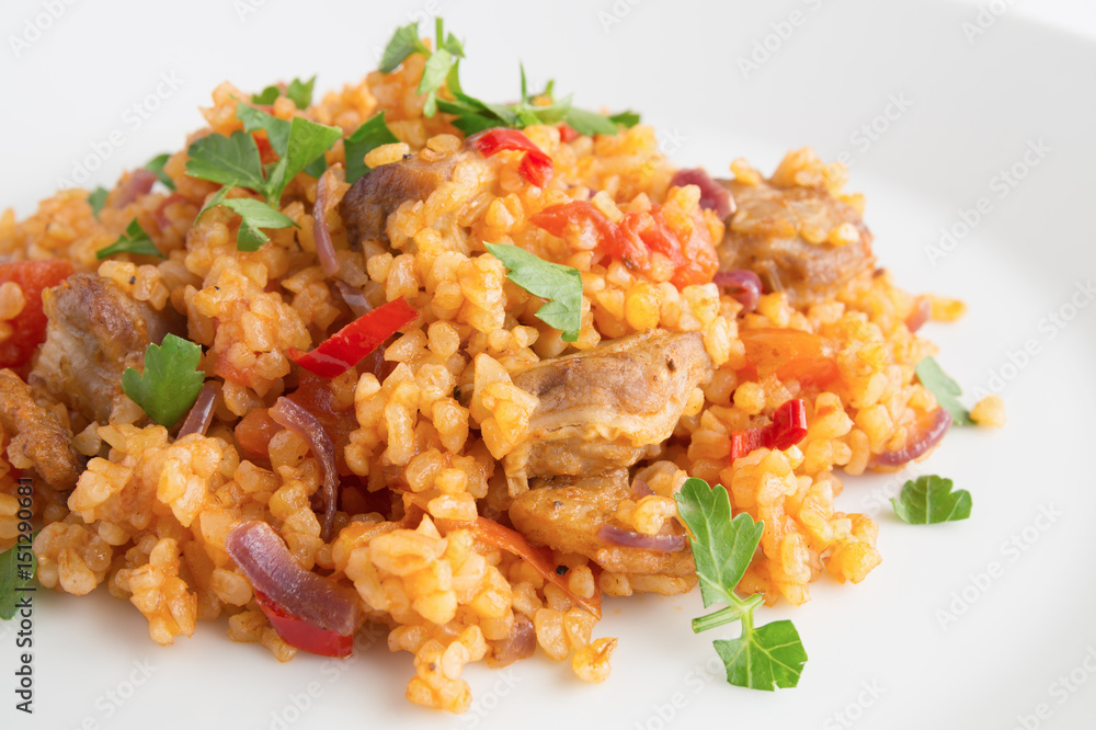 wheat pelaf with meat, tomato, onion, and pepper wheat pelaf with meat, tomato, onion, and pepper