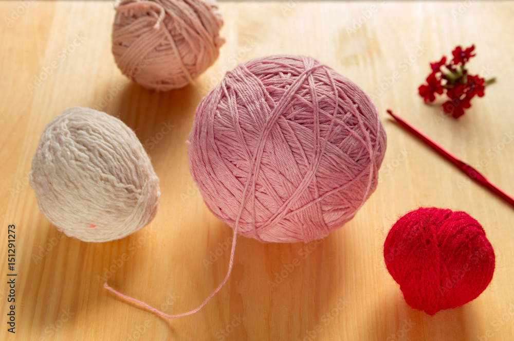 Yarns for knitting on a table. Yarns for knitting on a table.