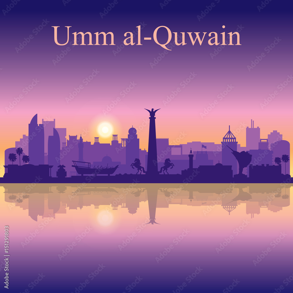 Obraz premium Umm al-Quwain silhouette on sunset background