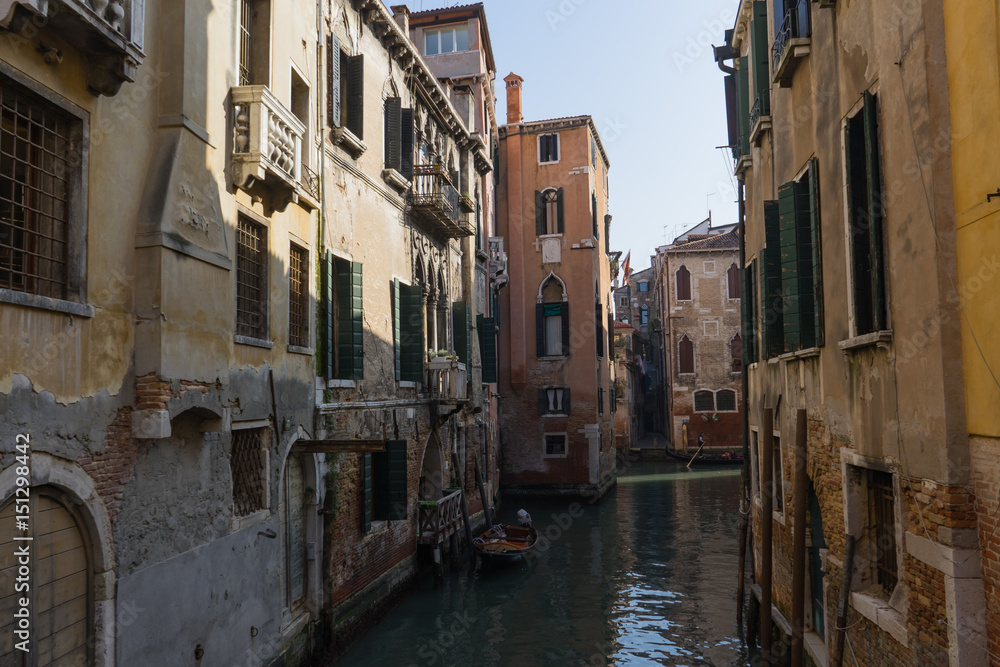 A canal between old venetian buildings, Venice, Italy