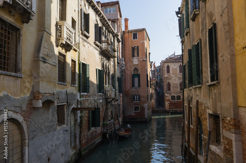 A canal between old venetian buildings  Venice  Italy