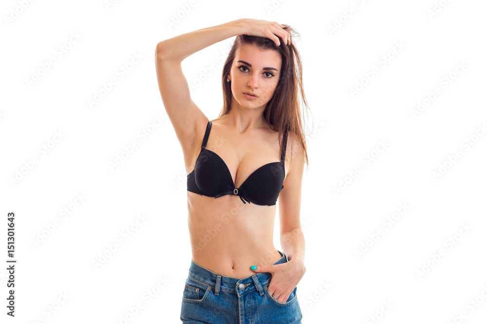 charming girl in black bra with beautiful breasts poses on camera charming girl in black bra with beautiful breasts poses on camera
