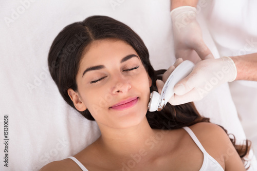 Therapist Giving Laser Epilation Treatment