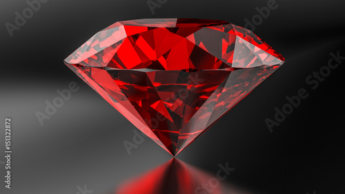 Ruby diamond on the dark background.