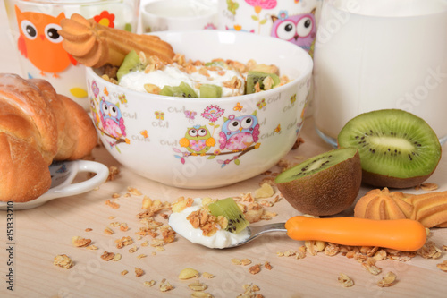 Delicious breakfast for children with kiwi and banana