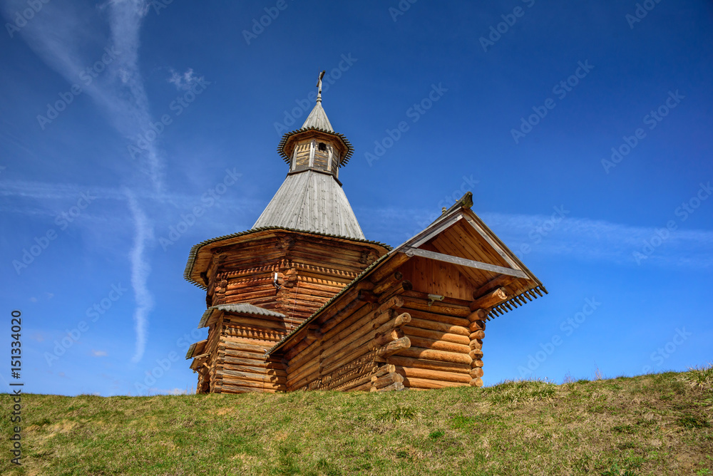 Spring view of the wooden Travel Tower of the Nikolo-Korelsky Monastery in the Kolomenskoye Museum at sunny day, Moscow, Russia Spring view of the wooden Travel Tower of the Nikolo-Korelsky Monastery in the Kolomenskoye Museum at sunny day, Moscow, Russia